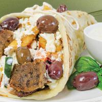 Traditional Gyro · Freshly made pita bread served 'Santorini-style,' stuffed with fries.  

Filled with our sig...
