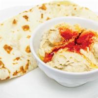 Pita & Hummus · Nothing tastes better on our freshly grilled pitas than our creamy and flavorful hummus sauc...