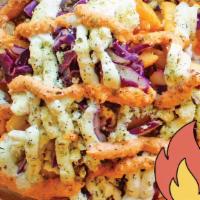 Loaded Feta Fries · A very generous amount of feta along with crunchy fresh cabbage makes these fries one of our...