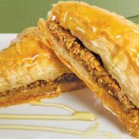 Baklava · Sweet, flaky pastry filled with a buttery crumble of nuts and cinnamon. Drizzled with our fr...