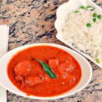 Chicken Tikka Masala · Marinated chunks of boneless chicken breast cooked in the tandoor and finished in a deliciou...