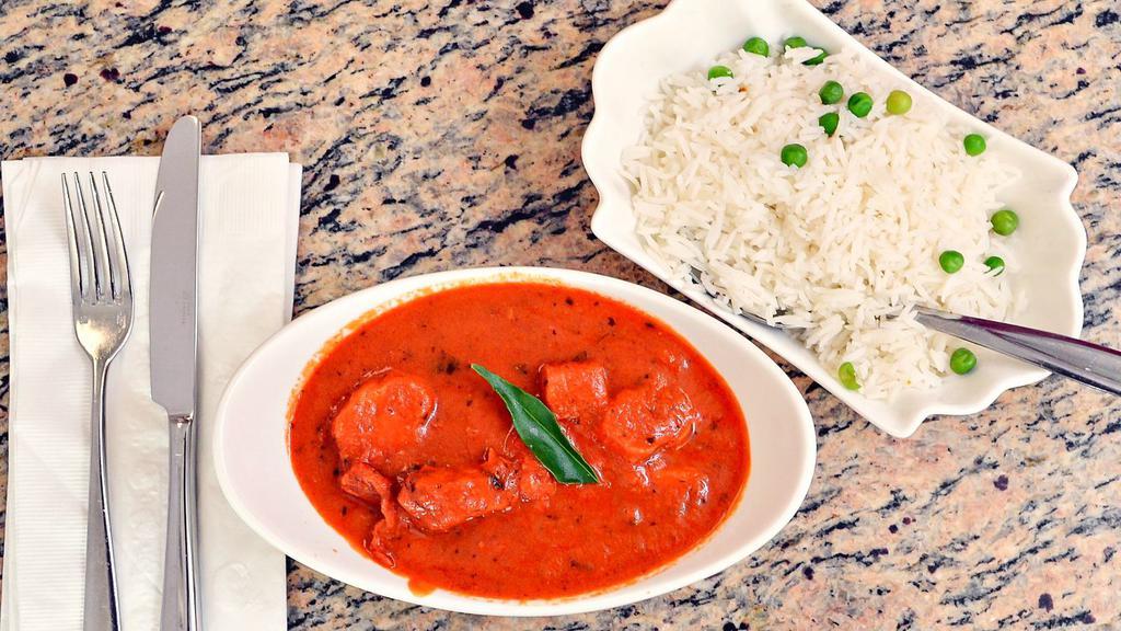 Chicken Tikka Masala · Marinated chunks of boneless chicken breast cooked in the tandoor and finished in a delicious chefs special sauce with cream.