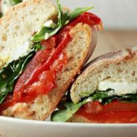 Roasted Red Peppers · Grilled red bell peppers, mozzarella cheese, olive oil, arugula, tomato, balsamic vinegar.