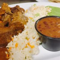 #22. Carne Guisada · Beef stew made with a rich, savory sauce. Served with rice, whole beans, avocado, and two to...