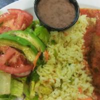 #28. Chile Relleno · Pasilla green pepper stuffed with your choice of seasoned pork, chicken, or cheese dipped in...