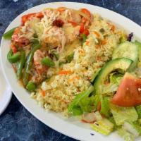 #31. Camarones Guanacos · Shrimp sauteed with onion, tomato, green and red bell pepper, and topped with shredded Monte...