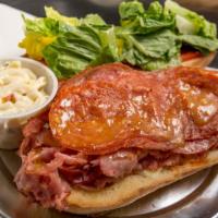 The Italian Sandwich · Salami, pepperoni ham, Italian dressing & provolone. Lunch size sandwich is a half sized san...