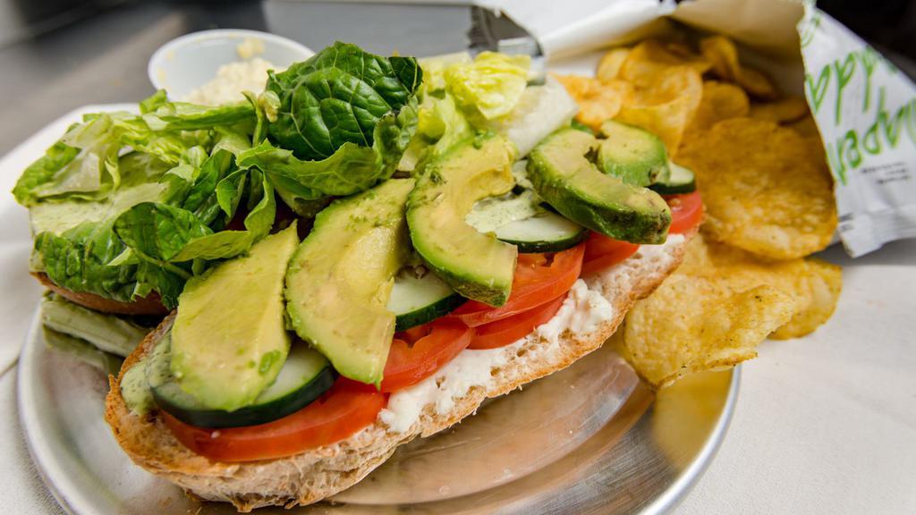 The Veggie Garden Sandwich · Cucumber, avocado, lettuce, tomatoes, masterz sauce & cream cheese. Lunch size sandwich is a half sized sandwich.