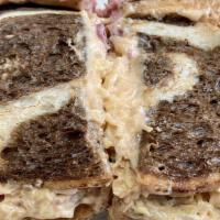 The Russian Reuben Combo · Pastrami, sauerkraut, Russian sauce, Swiss. Lunch combo is a half size sandwich, salad or wr...