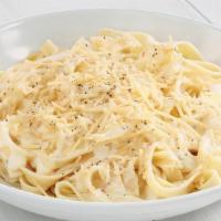 Fettuccine With Alfredo · Fettuccine topped creamy garlic and parmesan Alfredo sauce topped with shaved Parmesan chees...