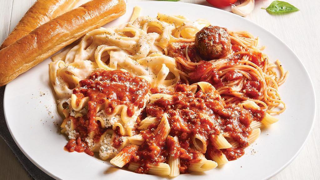 Ultimate Sampler · Fettuccine Alfredo, Penne with Meat Sauce, Spaghetti and Meatball, Lasagna with Meat Sauce.. Includes 2 of our Signature Garlic Breadsticks.. If you're looking to add an additional side or toppings, please visit the Sides/Extras section of the menu.