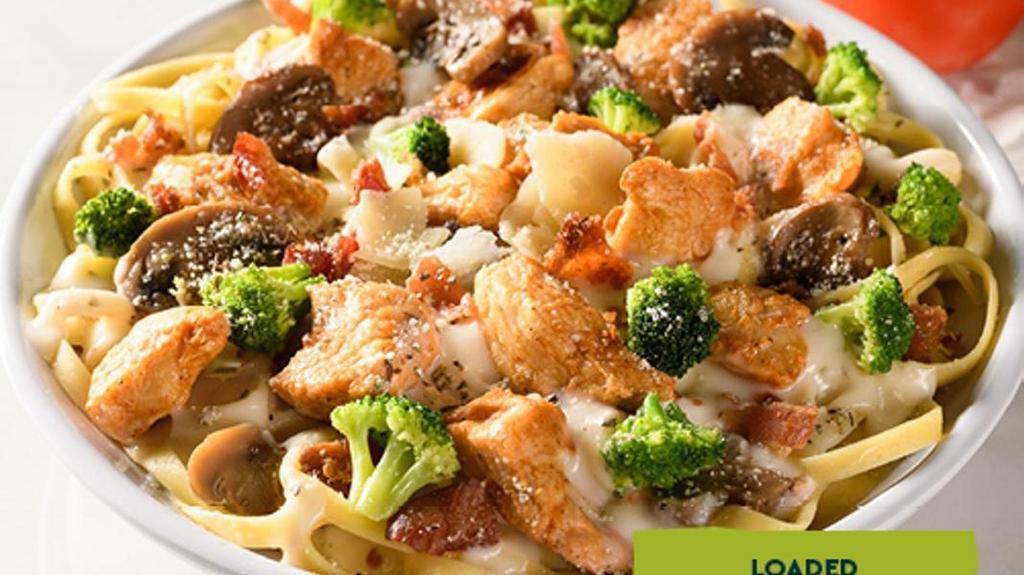 Loaded Fettuccine Alfredo · Alfredo Sauce, Chicken, Bacon, Garlic-Roasted Mushrooms, Broccoli. Includes 2 of our Signature Garlic Breadsticks. If you're looking to add an additional side or toppings, please visit the Sides/Extras section of the menu.