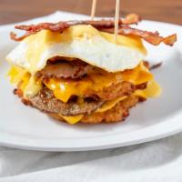 Am Pile Up Am · Three of our famous potato pancakes piled high with two eggs, bacon, ham, sausage, cheddar, ...