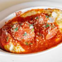 Stuffed Shells · Three jumbo pasta shells stuffed with Ricotta cheese and topped with our red sauce.  Choose ...