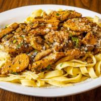 Chicken Marsala · Tender chicken breast sauteed in Marsala Wine sauce with mushrooms and served over homemade ...