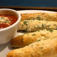 Old School Bread Sticks · Served with our red sauce.