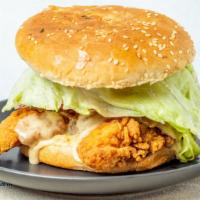 Char Chicken Burger · Homemade chicken Pattie char cooked, with white cheese,lettuce, tomatoes, grilled onions, se...