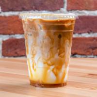 Dulce De Leche · House-made caramel sauce mixed together with our brewed coffee and steamed milk. Topped with...