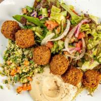 Falafel Plate · Served with your choice of 2 Mediterranean sides, 6 falafel balls, fresh garden salad, tomat...