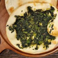Spinach Pie · Baby spinach personal size pizza style pies.