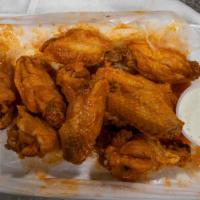 Buffalo Wings By The Piece · Crispy wings, sauced and tossed in your favorite flavor. Comes with your choice of dipping s...