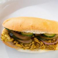 Curry Chicken Banh Mi Sandwich (S3) · Coconut milk, caramelized onions, cucumber, cilantro, pickled carrots and daikon, jalapeños,...