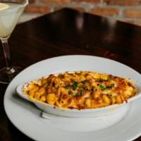 Baked Mac & Cheese · sharp cheddar sauce baked with breadcrumbs.