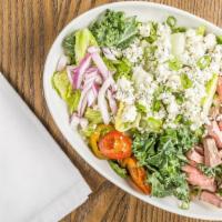 Steakhouse Chopped Salad · Grilled sliced steak, blue cheese crumbles, spicy pickled peppers, red onion, romaine, kale,...