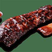 Baby Back Ribs · Two slow-smoked options: Original baby backs seasoned with our Chicago-style rib rub then sa...