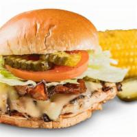 Hickory Chicken Sandwich · Grilled chicken breast topped with Monterey Jack cheese and two strips of bacon. Served with...