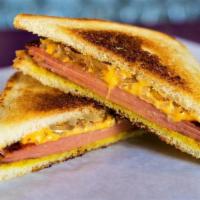 Fried Bologna Sandwich · Made with American Cheese, Grilled Onion & Mustard on White Bread