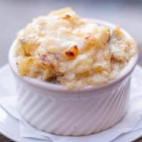 Macaroni  & Cheese · macaroni with gruyère fondue, cheddar and topped with parmesan