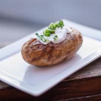 Baked Potato · baked russet potato topped with butter, sour cream, chives