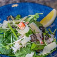 Snow Crabmeat Salad · Fresh spring mix topped with snow crab, radish sprouts, Parmesan cheese and French dressing.
