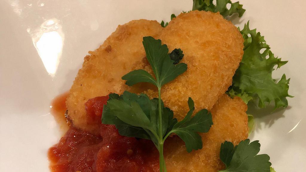 Crab Cream Croquette (3 Pcs.) · Deep-fried Croquette stuffed with crab cream, topped with tomato sauce.