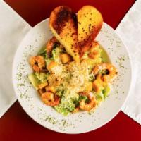 Jamaican Shrimp And Scallop Salad On Top Of Caesar · 