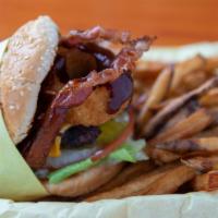Western Burger · 1/4 lb beef patty topped with smokey BBQ sauce, two strips of bacon, a crispy onion ring and...