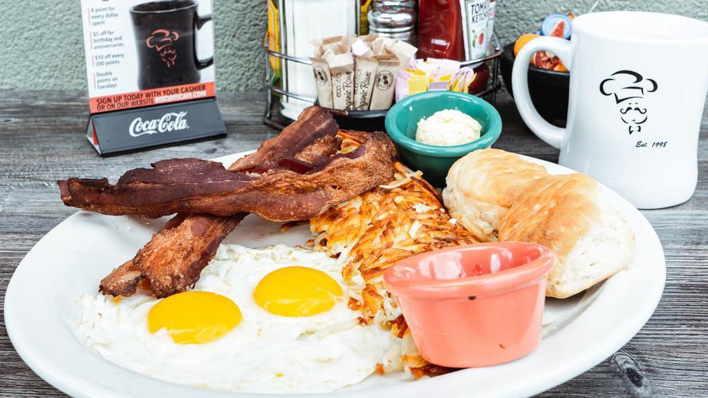Eggs Your Way · Two eggs with your choice of bacon, ham, turkey bacon, sausage links, or sausage patties. Served with hash browns or red potatoes, and your choice of biscuits, toast, or pancakes.