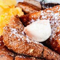 Almond Crusted French Toast Combo · Thick French toast bread dipped in our fresh egg batter & encrusted with almond-cinnamon. Th...