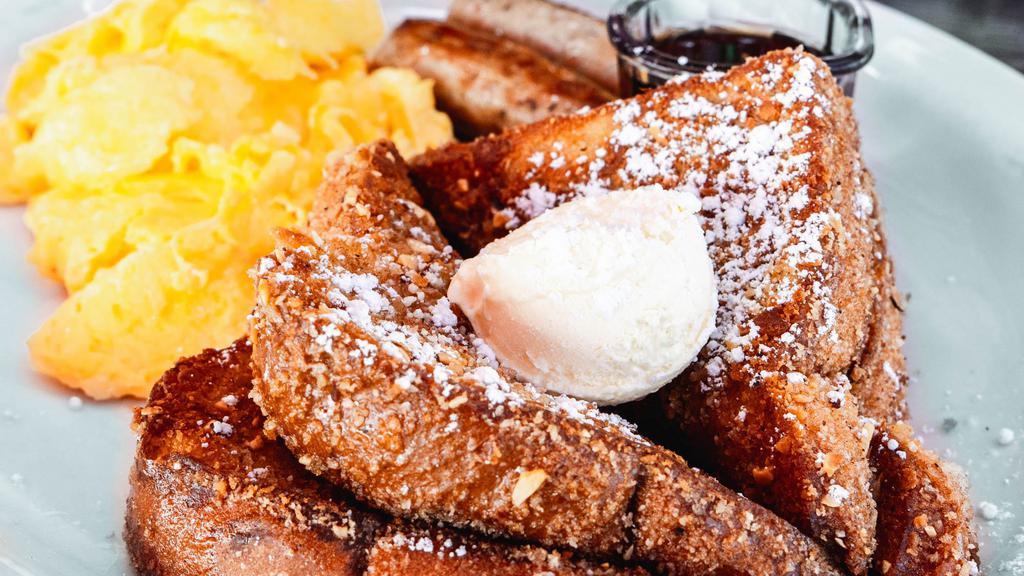 Almond Crusted French Toast Combo · Thick French toast bread dipped in our fresh egg batter & encrusted with almond-cinnamon. Then grilled to perfection.