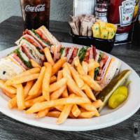 Club Sandwich · Served with ham, turkey, bacon, lettuce, tomato, mayo, and cheese.