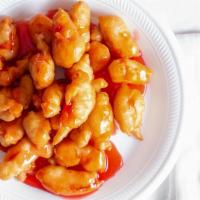 Sweet & Sour Chicken · With steamed rice.