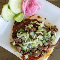 Taco Chingón · Carne asada taco on a tortilla, with grilled melted cheese and a whole roasted green chile. ...