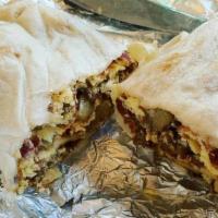 Bacon Burrito.. · Bacon, Eggs, Potatoes, Cheese, and Roasted Salsa on a White, Wheat, or Spinach Tortilla.