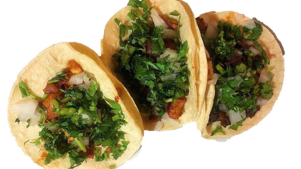 Tacos Authentic Style · Onion and Cilantro.