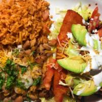 Enchilada Plate · Two corn tortilla enchiladas with red mild sauce, cheese, sour cream, pico de gallo, guacamo...