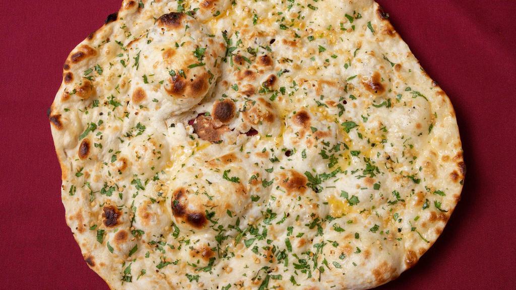 Garlic Naan · Most popular. Freshly baked bread seasoned with garlic prepared fresh in tandoor Indian clay oven.