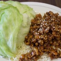 Chicken Lettuce Wraps · Ground chicken in special sauce served with lettuce.