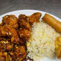 #15. General Tso'S Chicken 左鸡 (Spicy) · Served hot and spicy. Comes with egg roll, crab puff, egg fried rice.