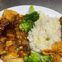 #20. Teriyaki Chicken 日本鸡 · Deep fried white meat chicken fillet with traditional teriyaki sauce. Comes with egg roll, c...